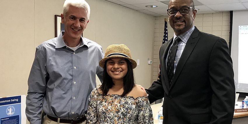 board members with student
