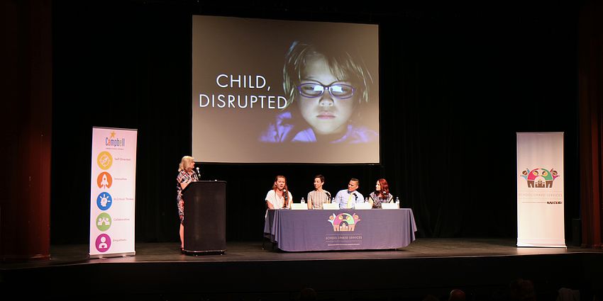panelists on stage at Child Disrupted