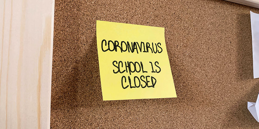 sign that reads: coronavirus school is closed