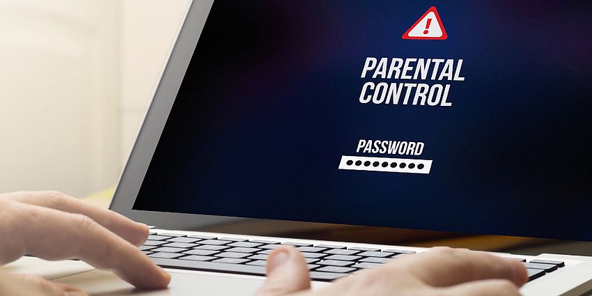 laptop showing parental control log in