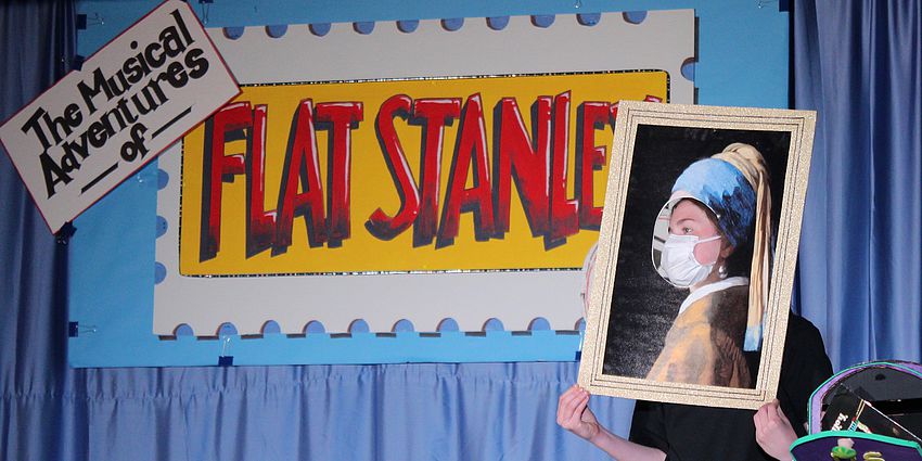 student on stage of flat stanley jr