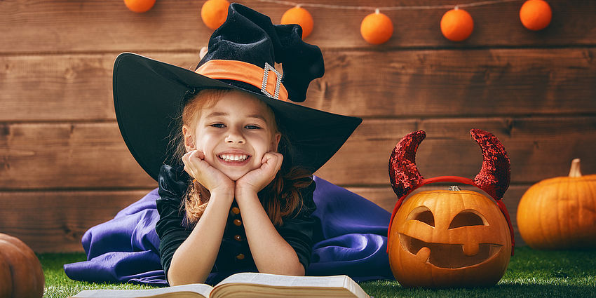 student in witch costume 