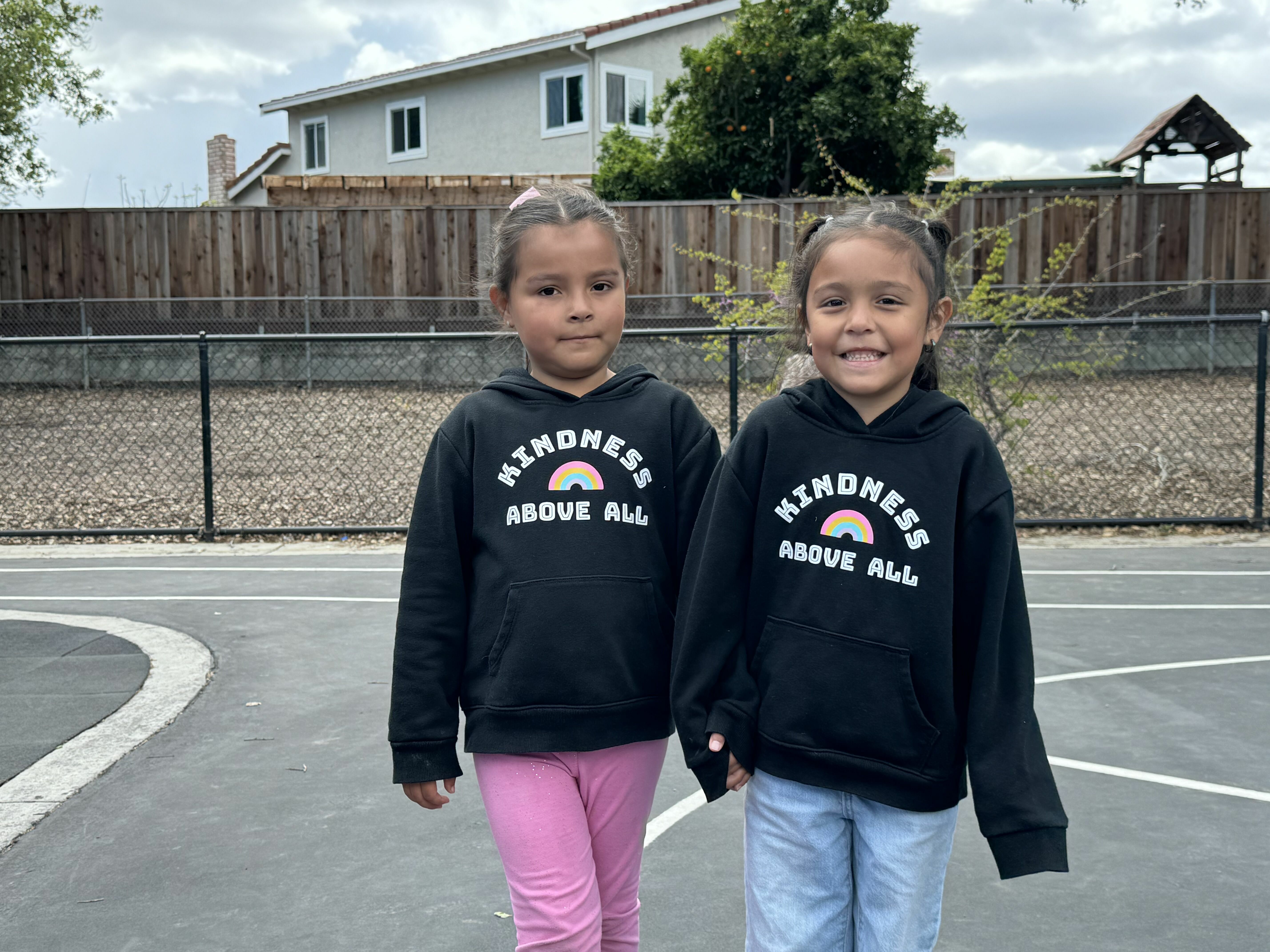 students with "kindness above all" shirts