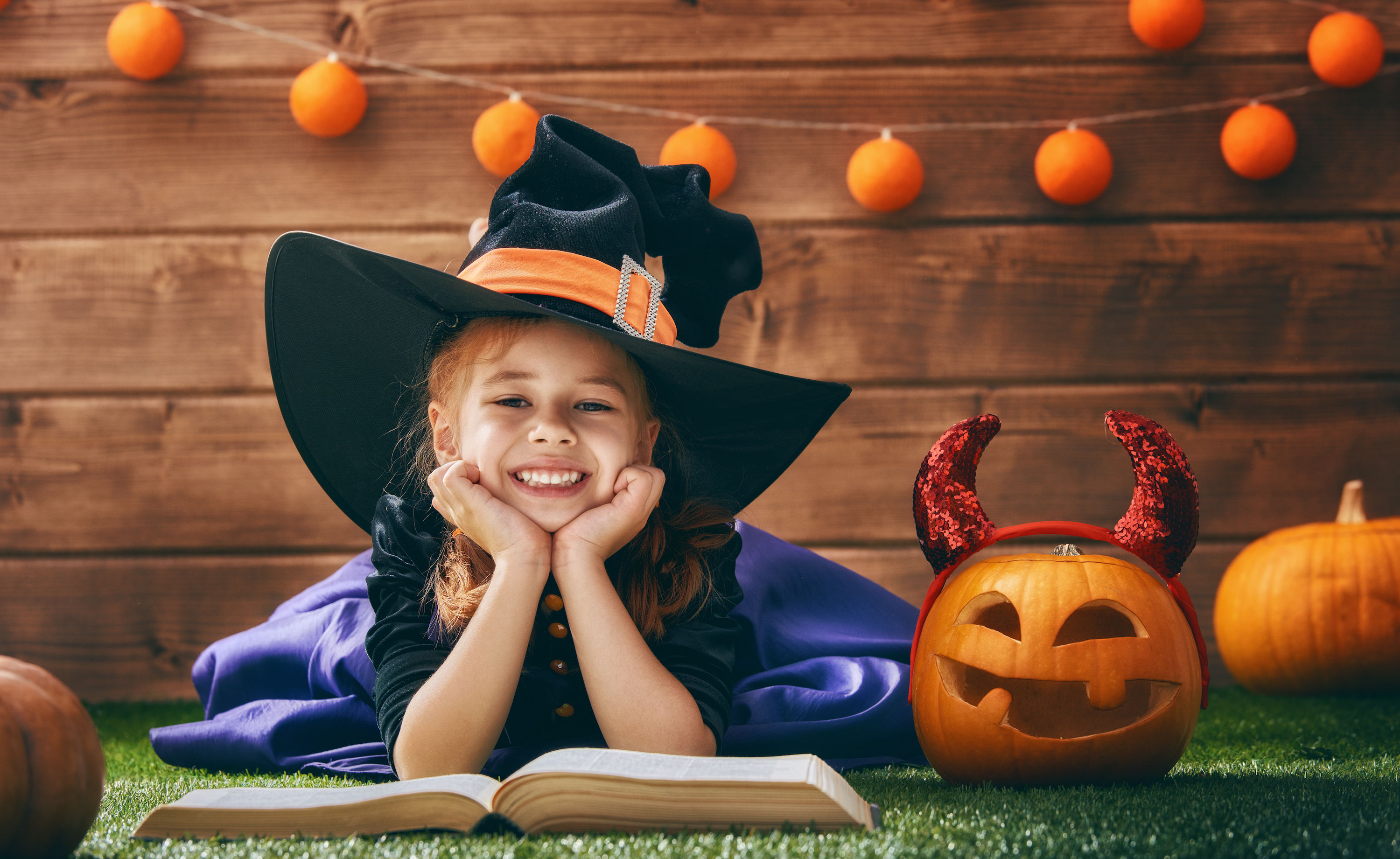 student in witch costume 